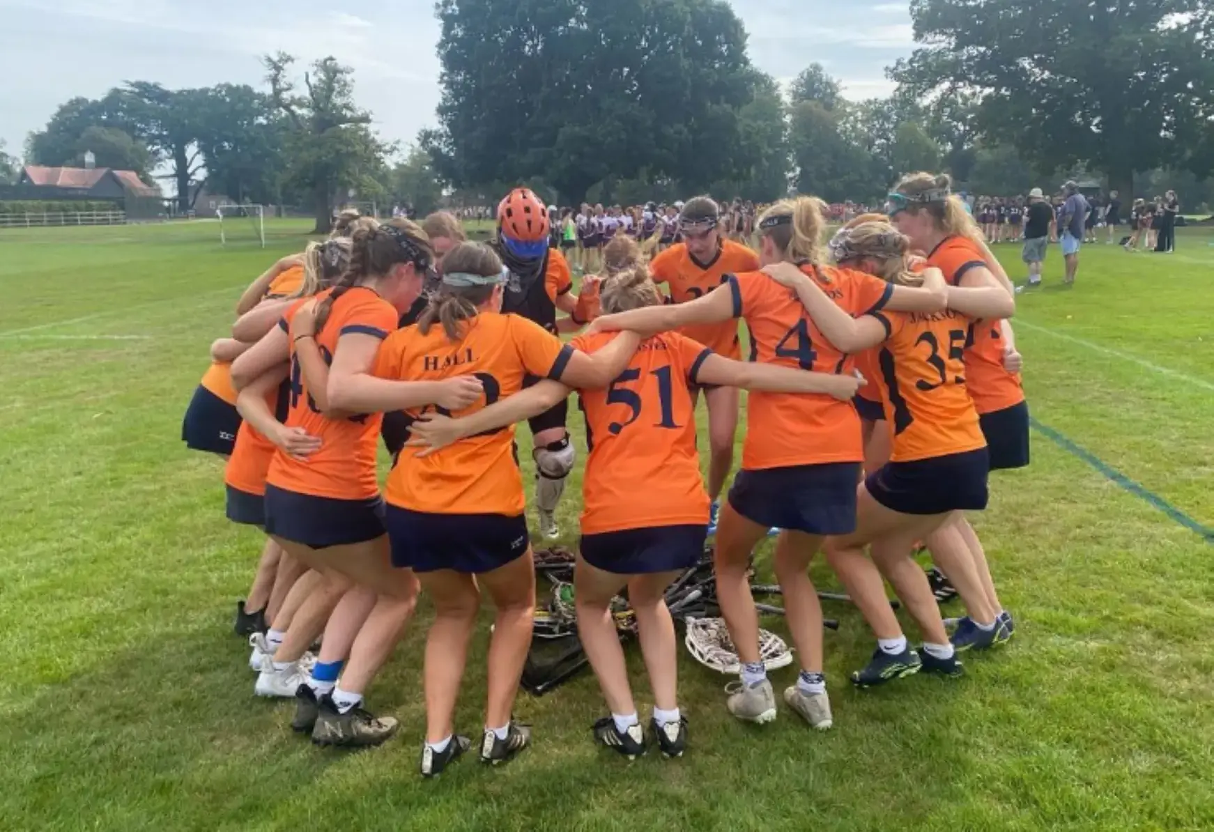 Student athletes in a huddle