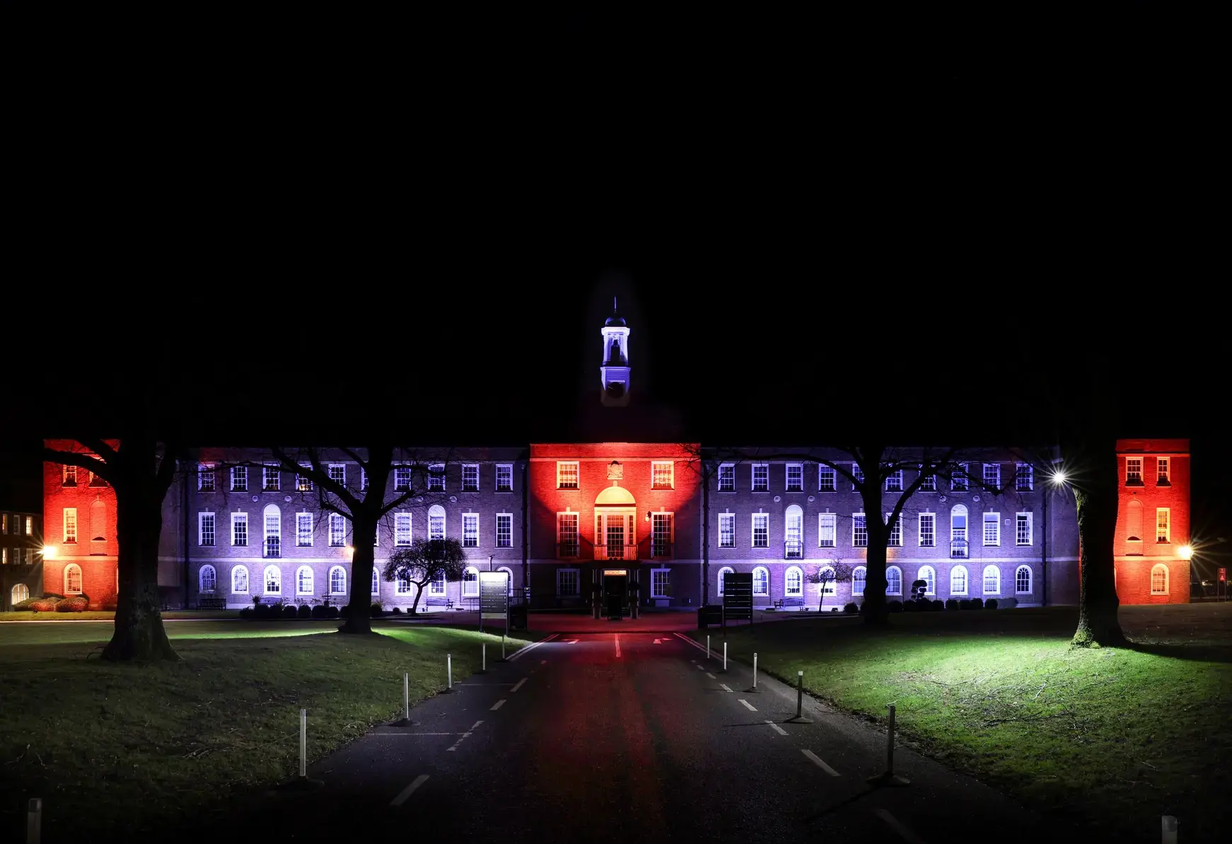 Exterior of school building at night