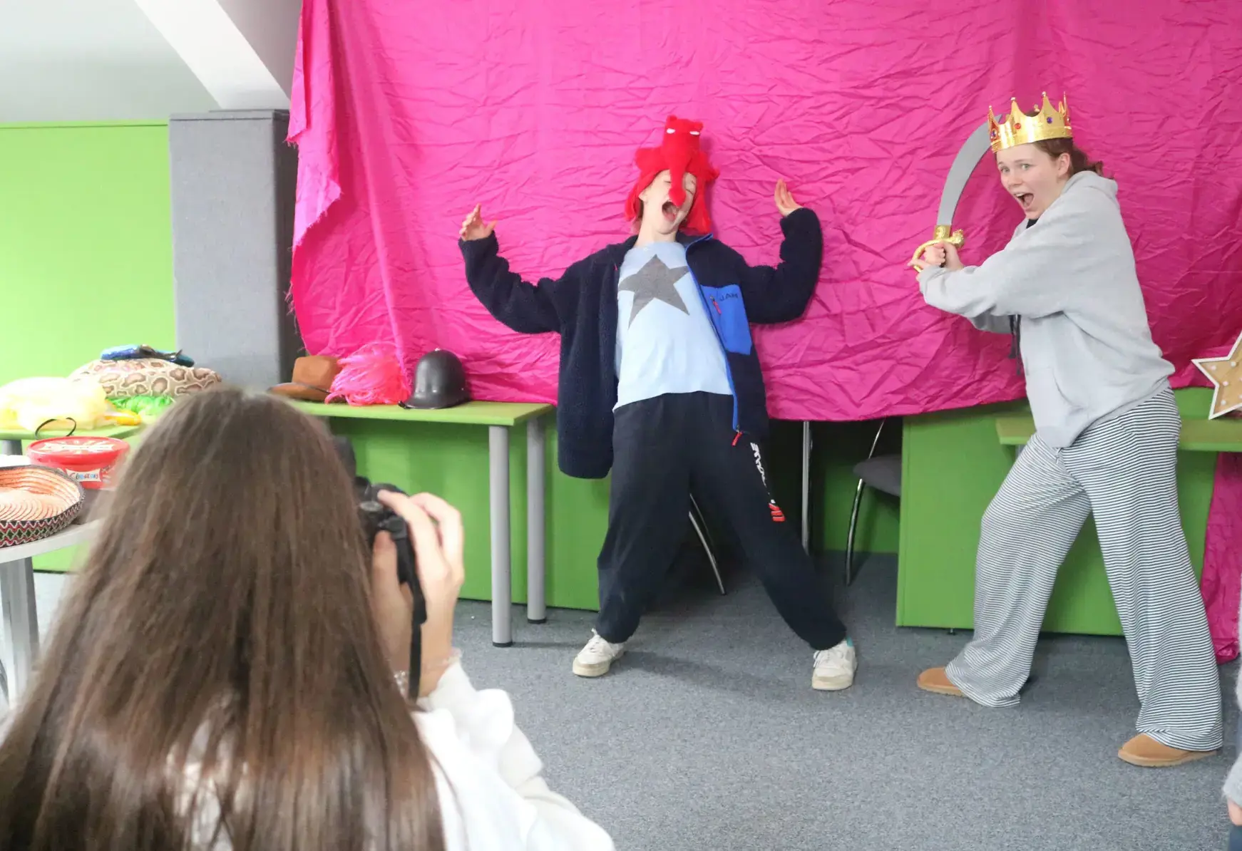 Students putting on a play in a classroom