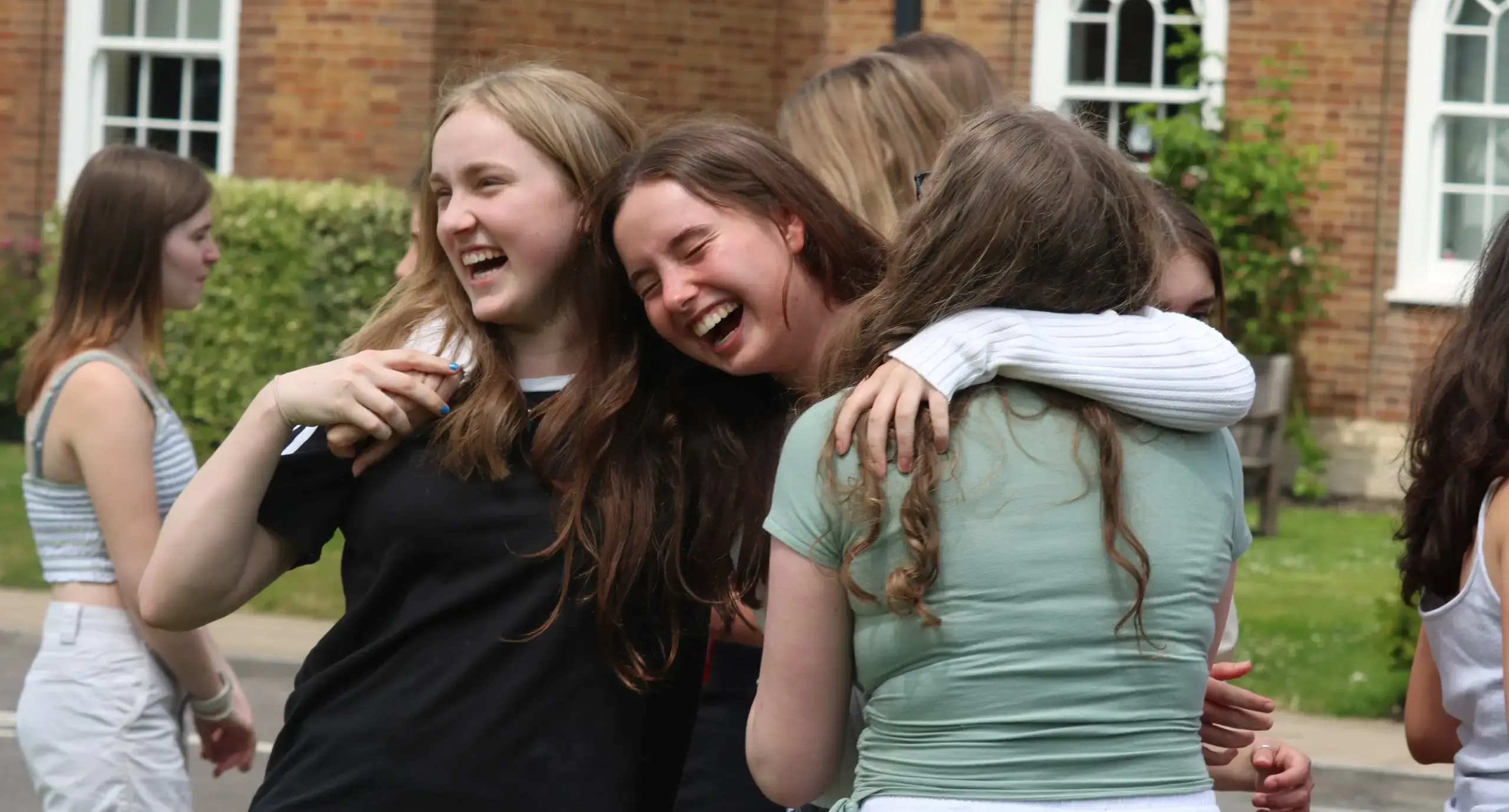 Students celebrating exam results