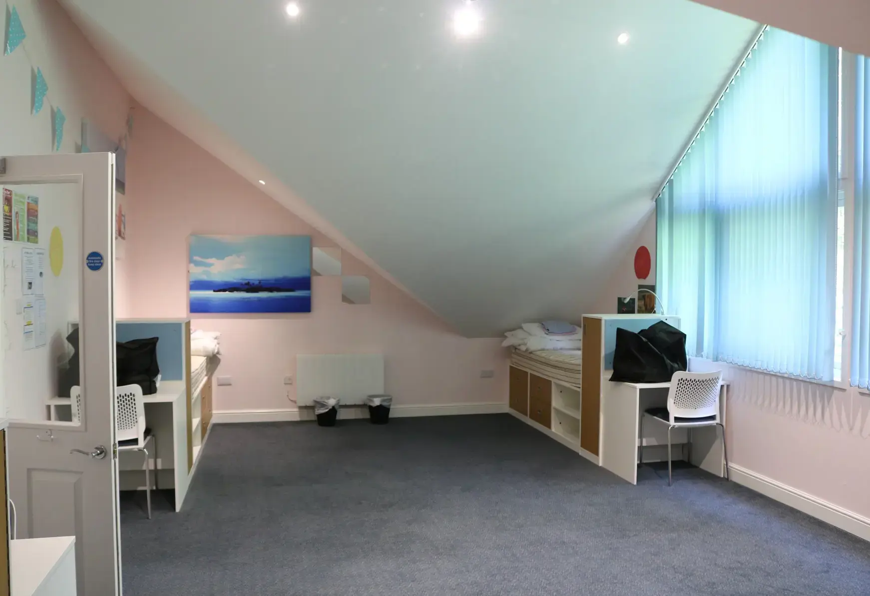 Interior of a student bedroom with two beds