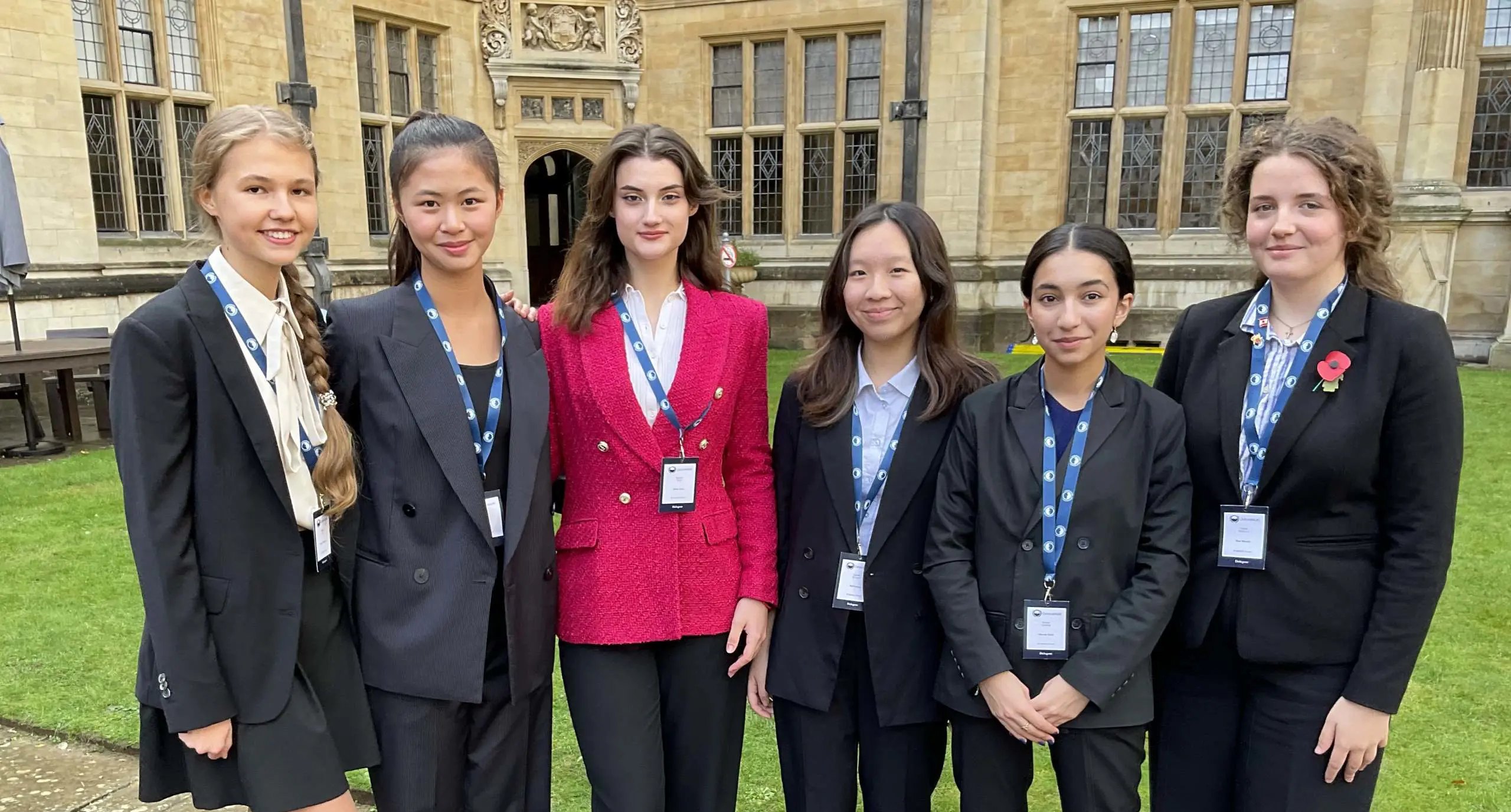 Oxbridge candidates stand outside a building