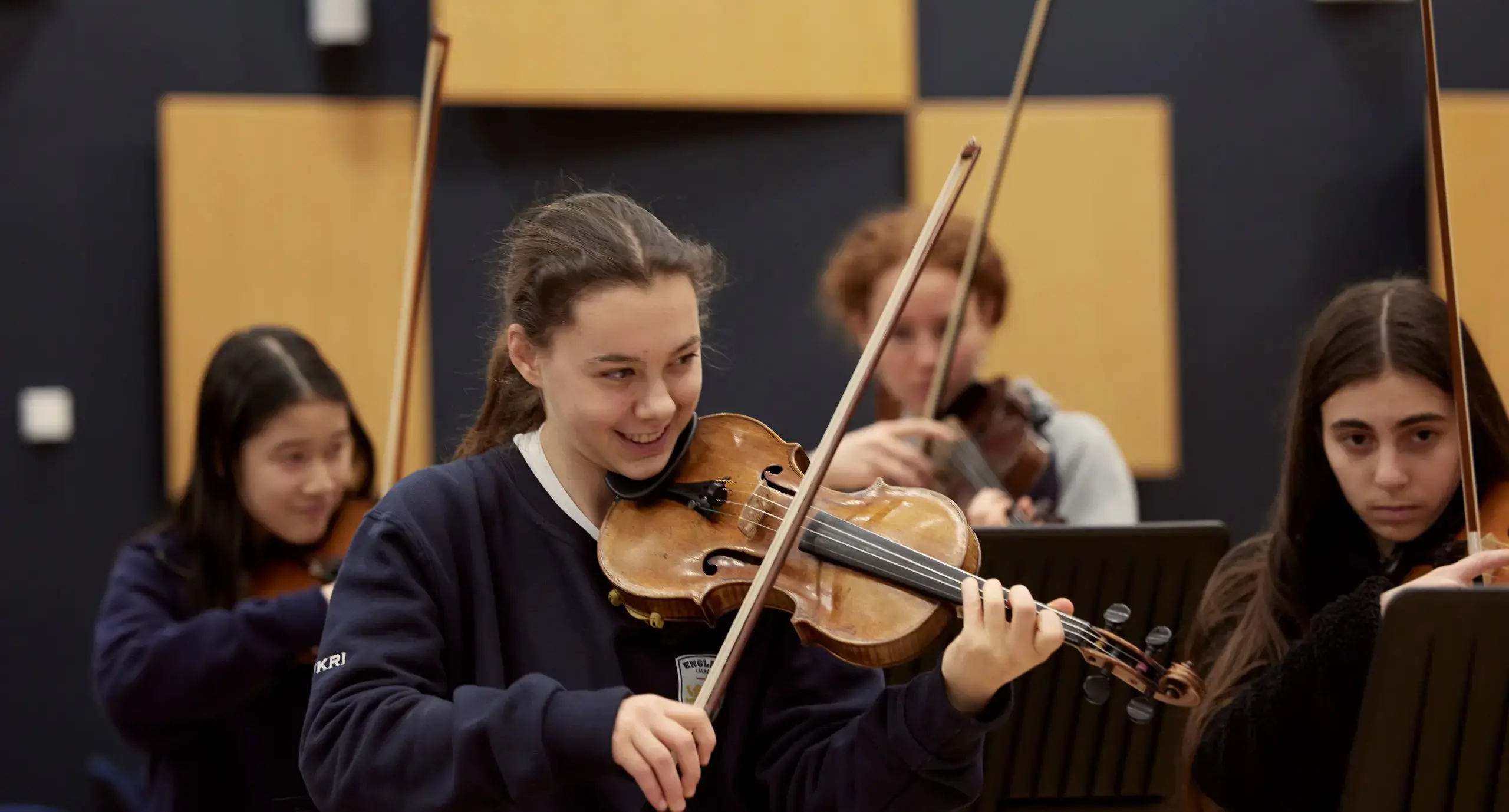 Students playing instruments