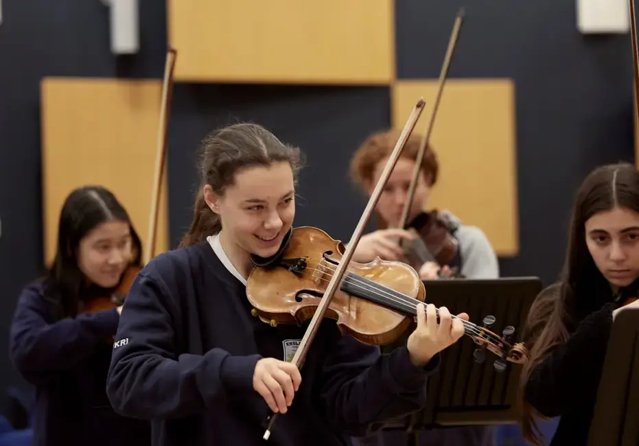 Seniors playing violins