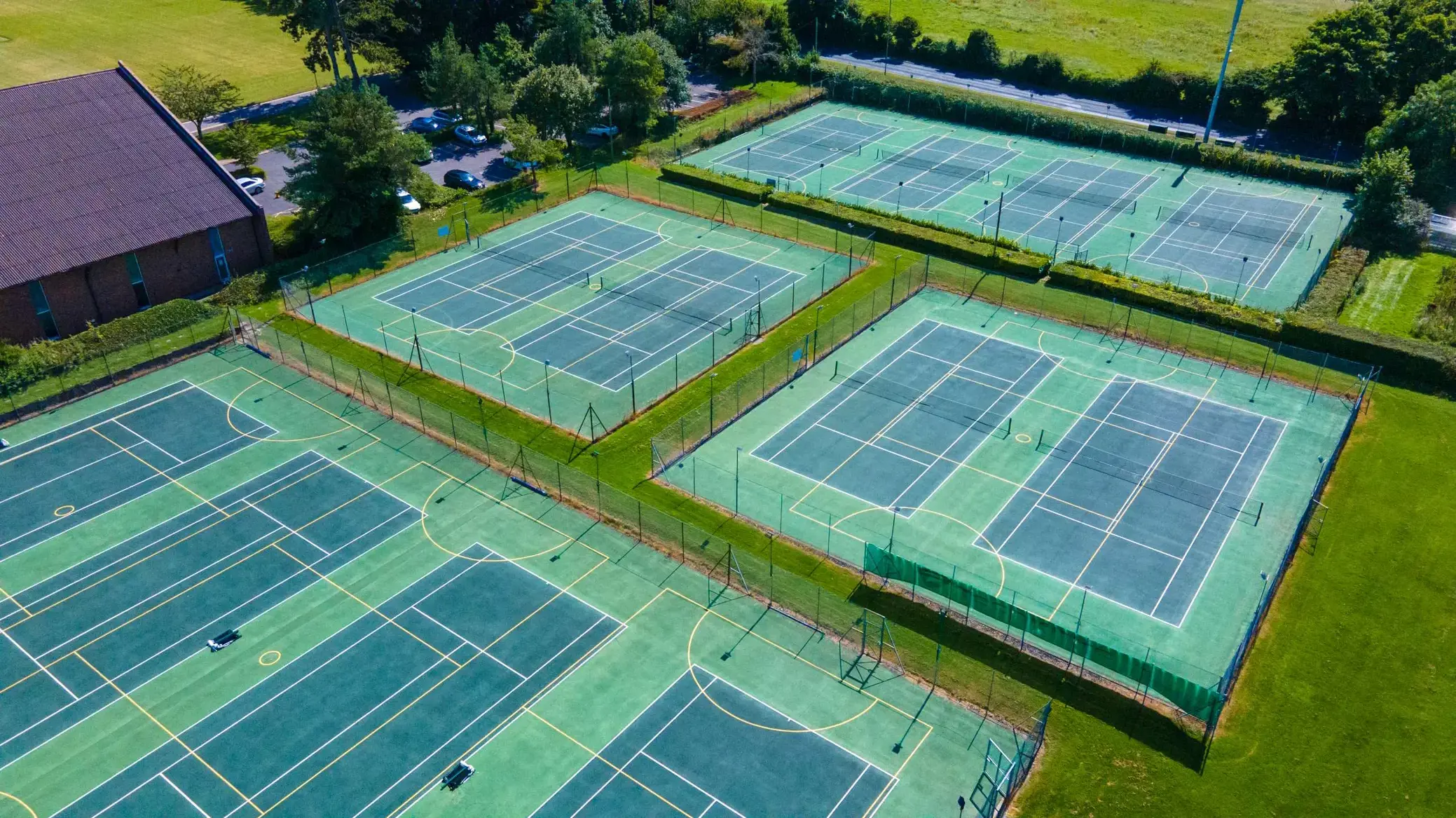 Several tennis courts of varying size