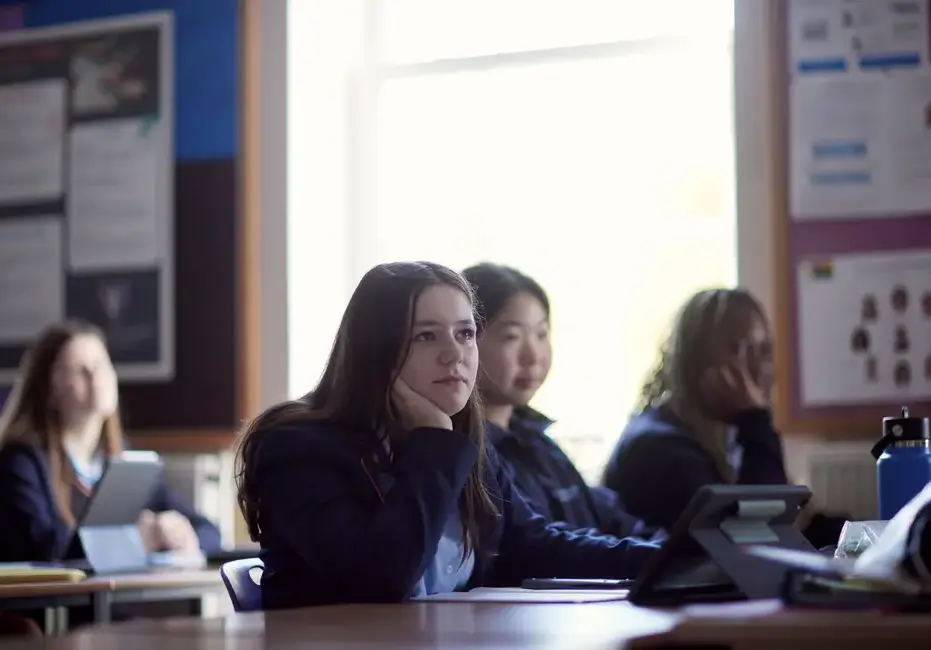 Students in lesson listening