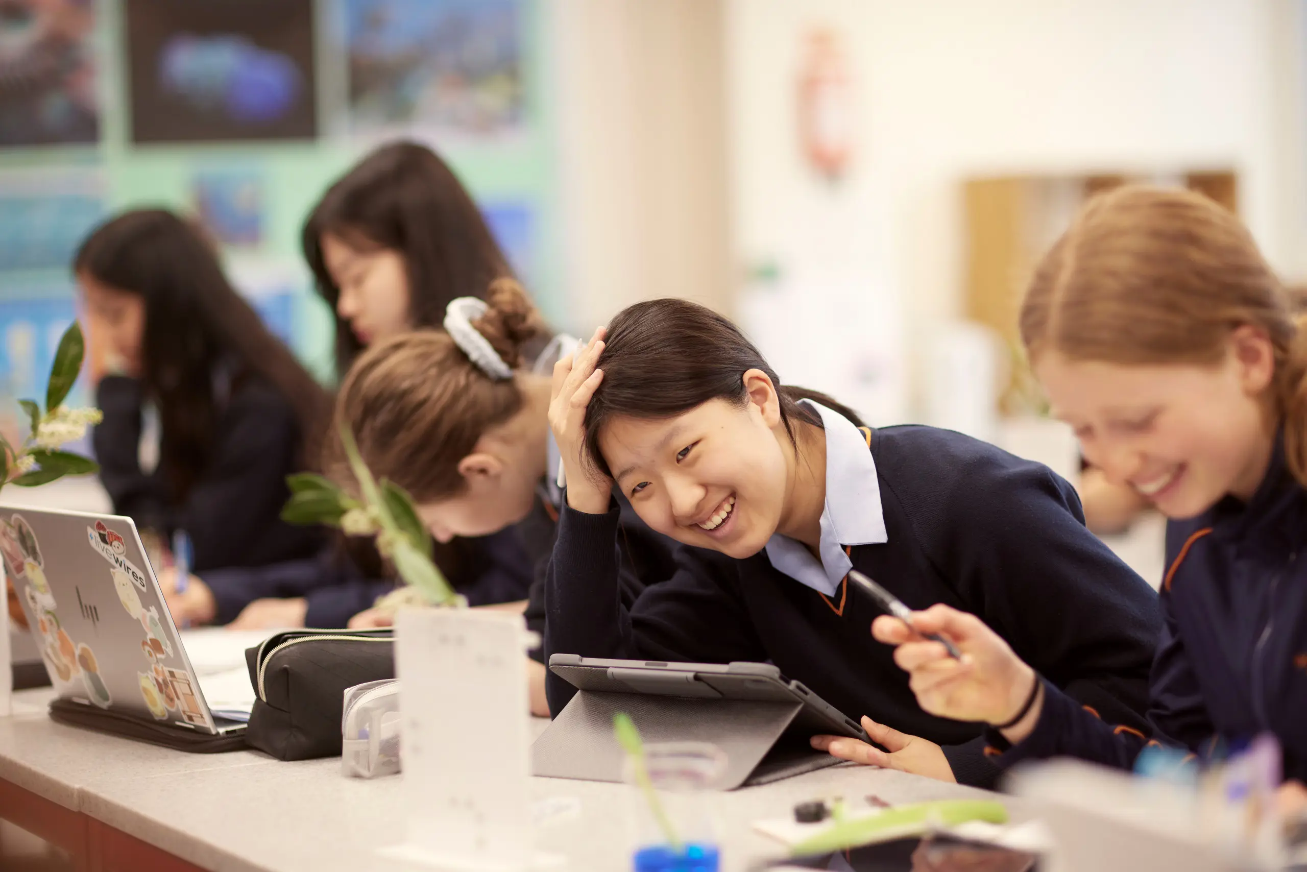 Students laughing in a lesson