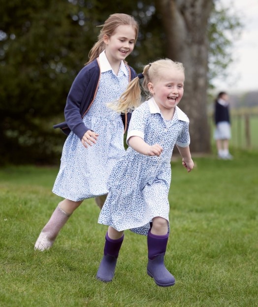 Students running on field