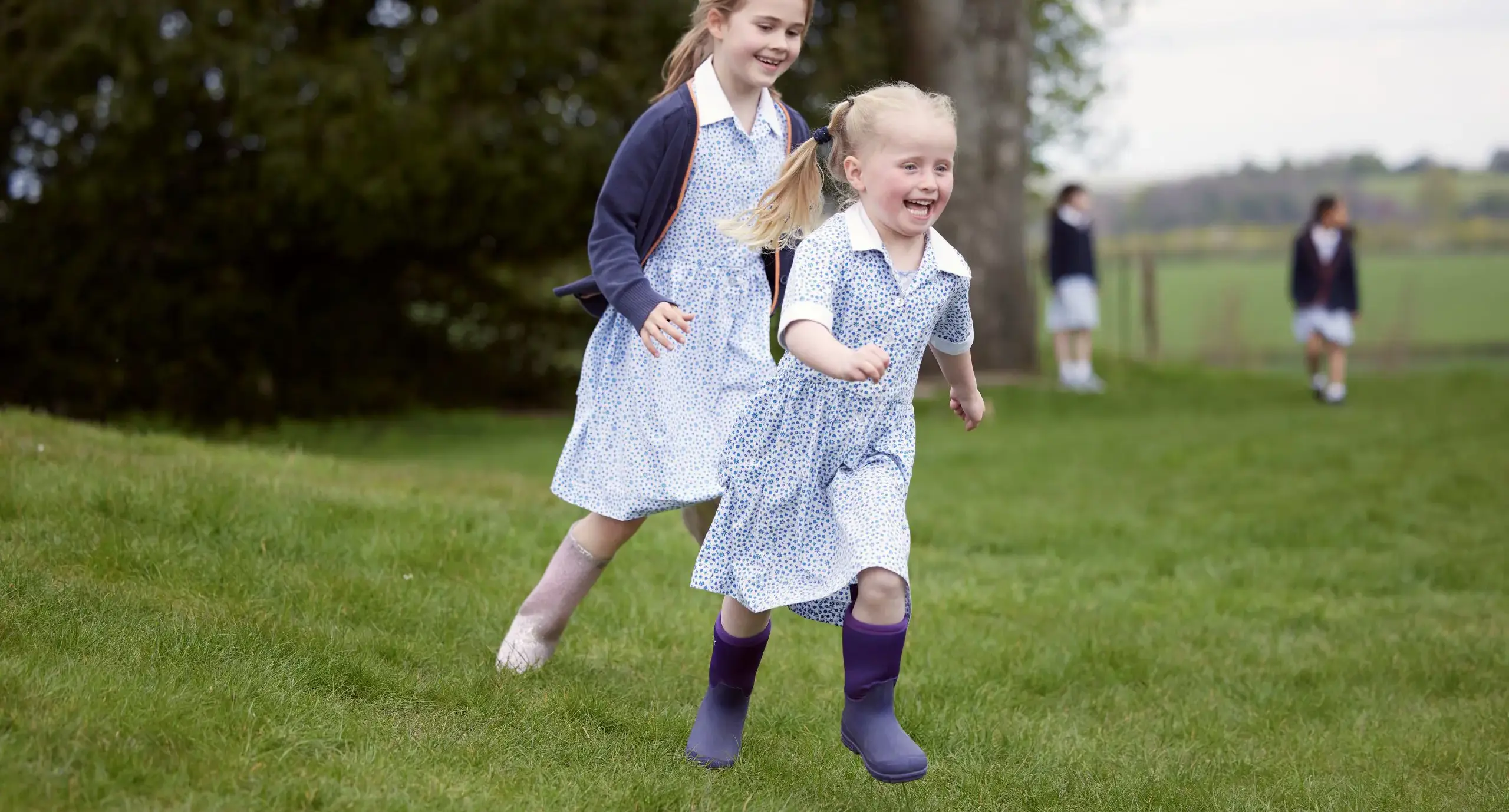 Two prep school students playing together