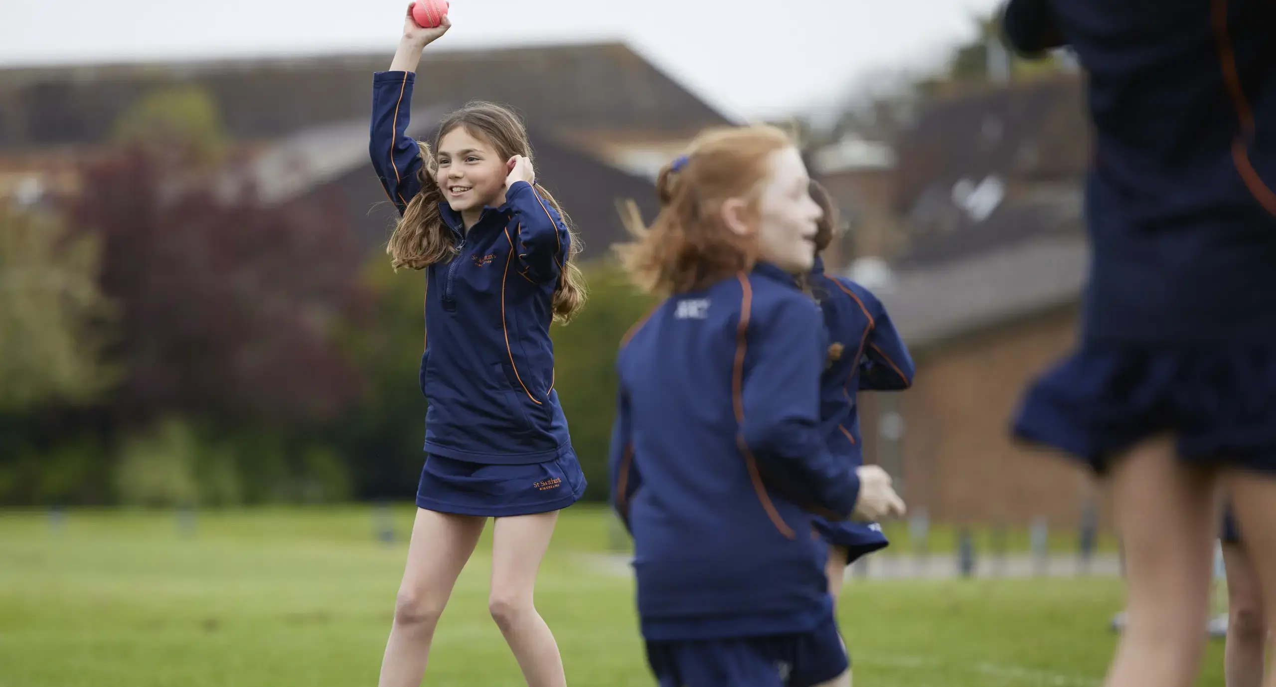 Student playing cricket