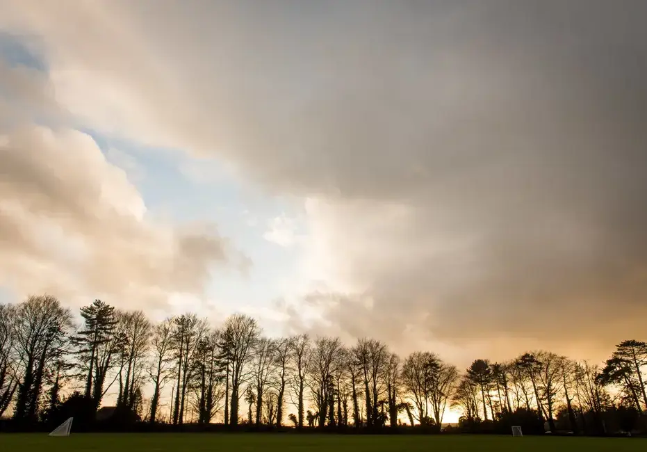 Shot of fields with lacrosse nets and sunset